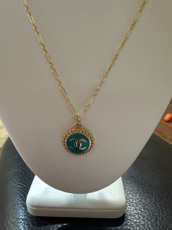 Repurposed Chanel zipper pull, Teal Round with gold C’s.