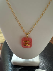 Repurposed Chanel zipper pull, Pink square with gold C’s on 14kt gold-filled 18” chain.