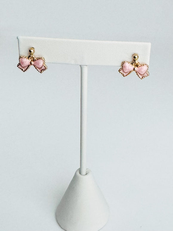 Light pink enamel bow earrings on 14kt gold ear studs
