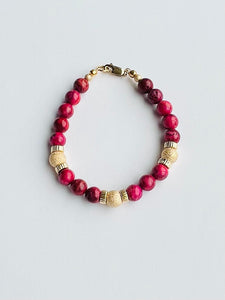 Fuchsia and gold-filled accents.
