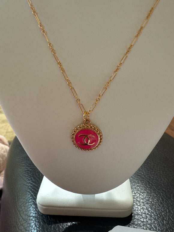 Repurposed Chanel zipper pull, Pink round with gold C’s.